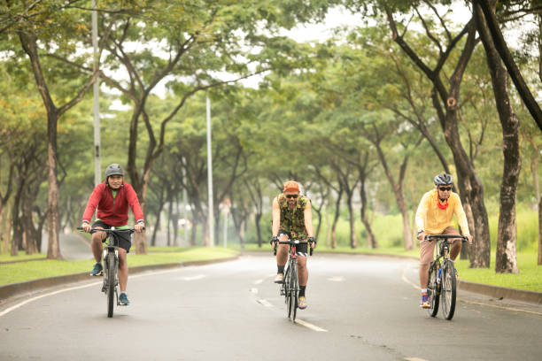 istock group of people riding bicycles in the morning 1298337580