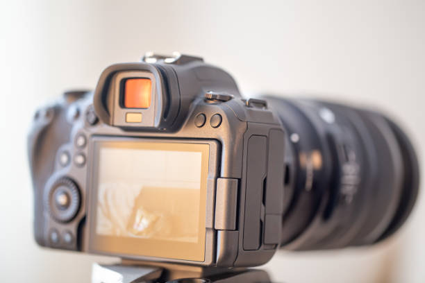 istock Close up part of a professional digital camera. 1298337985