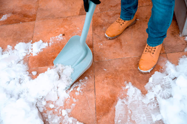 istock Cleaning the snow with plastic shovel. 1298338691