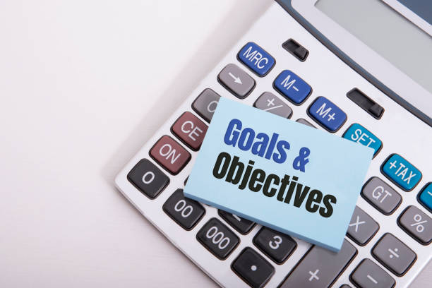 istock Goals and Objectives words written on card 1298342931