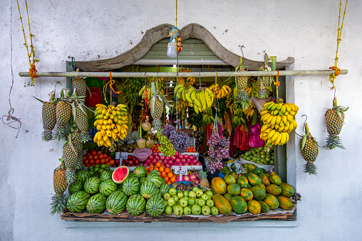 Large variety of fruit choices at a fruit market.