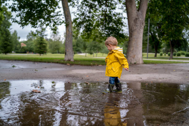 istock Little boy walking outdoors 1298345143