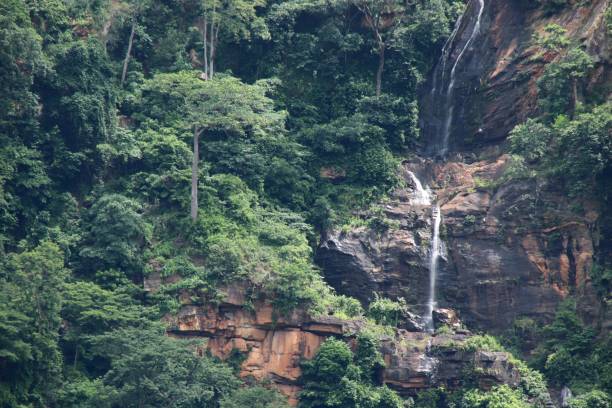 View to Waterfall Cascade de Kpimé in Kpalimé, Togo, West Africa. Kpalimé, Togo - June 26, 2019: View to waterfall Cascade de Kpimé in Kpalimé, Togo, West Africa. togo stock pictures, royalty-free photos & images