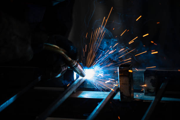 istock Metal worker using a grinder stock photo 1298350830