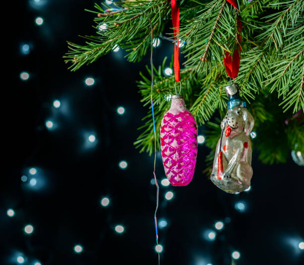 istock Vintage glass toys on a spruce branch 1298355281