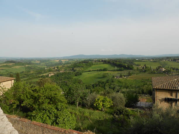 istock Tuscany fields viewed from San Gimignano 1298356260