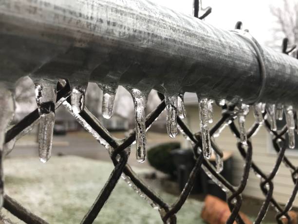 istock Ice on chain-link fence 1298360980