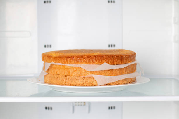 istock Fresh sponge cake. Frozen sponge cake in the freezer. 1298361685
