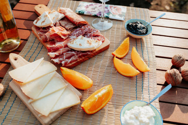 picnic table with sausages, cheese and traditional italian food. - italian cuisine wine food pasta imagens e fotografias de stock