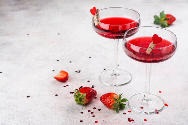 Two glasses of strawberry margarita stock photo