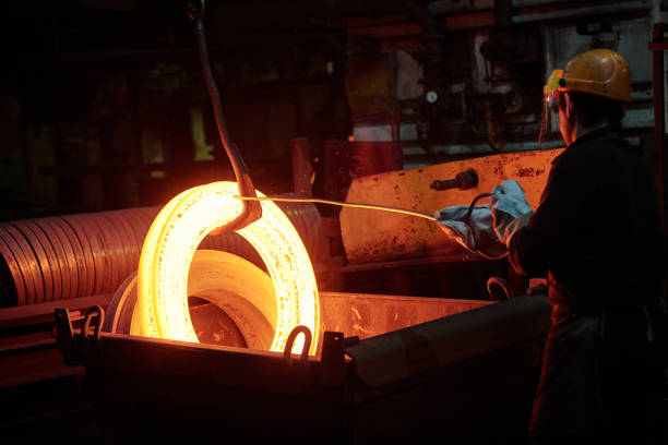 istock Worker in metal factory 1298373168