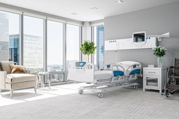 Empty Luxury Modern Hospital Room Interior of a modern luxury hospital room with city view. ward stock pictures, royalty-free photos & images