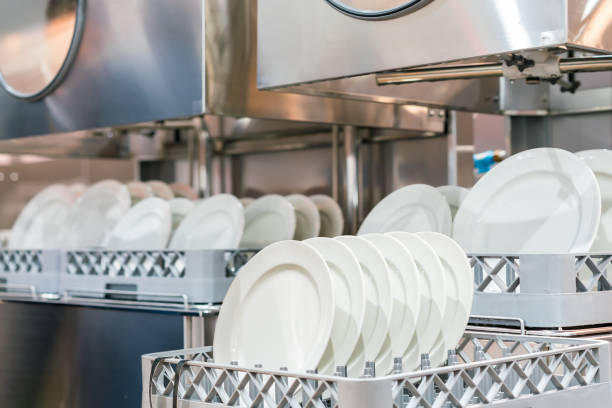 istock many dish or white plate arranged on basket for cleaning by automatic dishwasher machine in kitchen room restaurant 1298378619