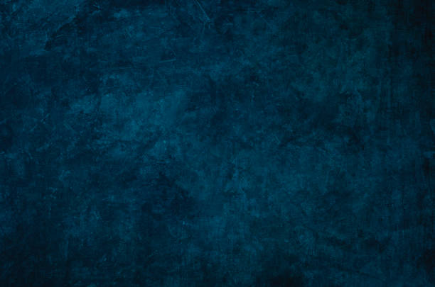 istock Dark blue grungy background 1298380090
