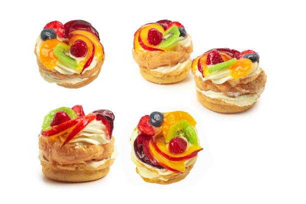 istock Home made cake with cream and fruit isolated 1298382431