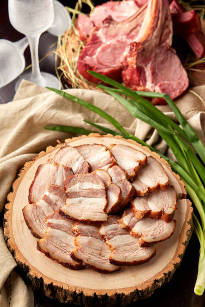 istock Roasted pork belly sliced on wooden plate 1298383749