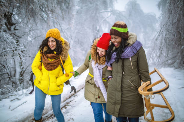 istock Friends laughing and enjoying the winter time 1298385041