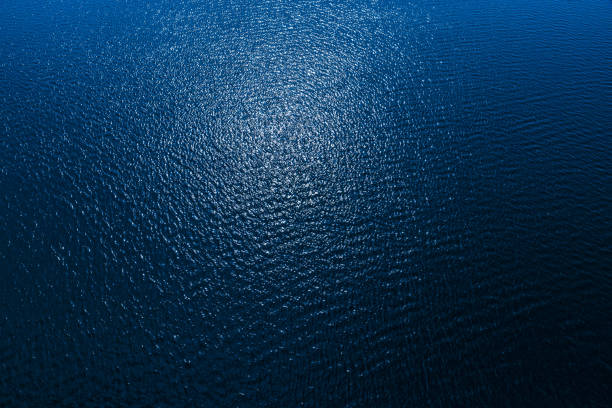 istock aerial view to deep blue water in river with sunlight 1298387389