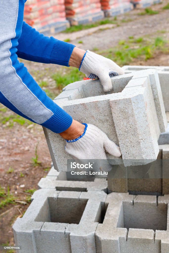 Slurry Blocks Worker Loads Cinder Blocks From Cement Slurry For Construction Stock ...