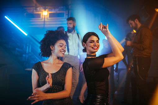 Young women partying in a nightclub