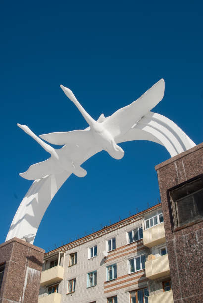 Zavodoukovsk, Russia - April 3, 2010: Flying cranes sculpture in the sky