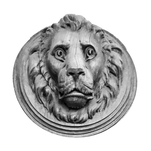 istock Wooden Lyon Head Sculpture Isolated 1298396113