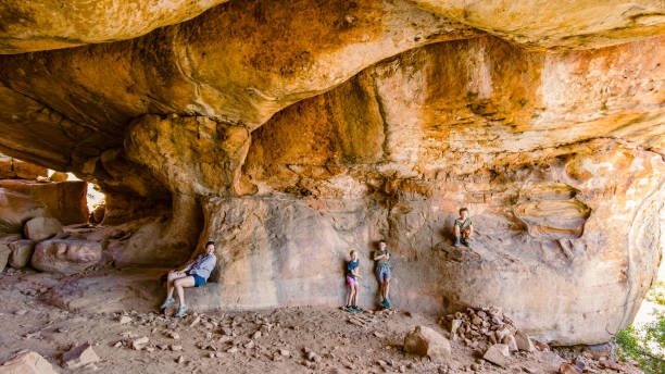 istock Family in a cave 1298397730