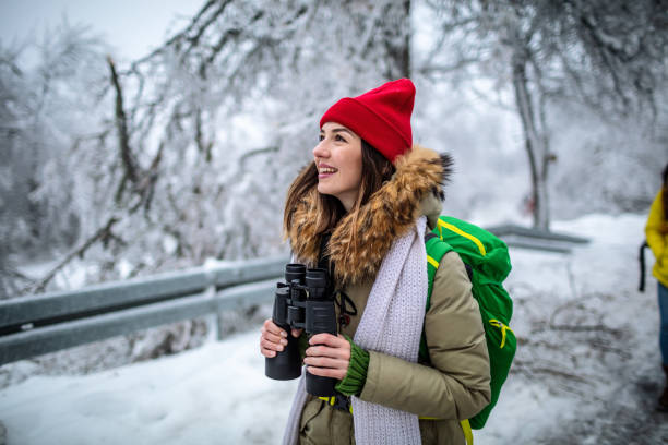 istock Young woman with backpack on a winter day 1298400466