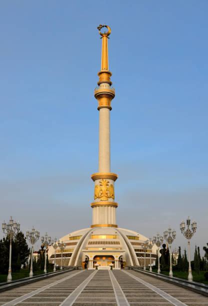 Ashgabat, Turkmenistan: Independence Monument - a 118 meter column topped with a gilded crescent with five stars - a symbol of the unity of the five largest Turkmen tribes, the lower part of the monument is a dome designed like a traditional Turkmen yurt tent.