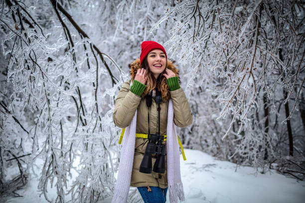 istock Young woman with backpack on a winter day 1298400570