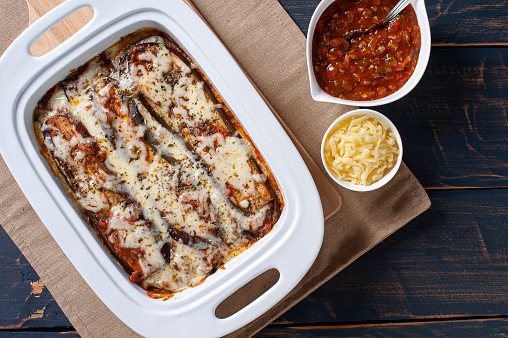 Eggplant parmigiana with cheese and tomato sauce. Top view
