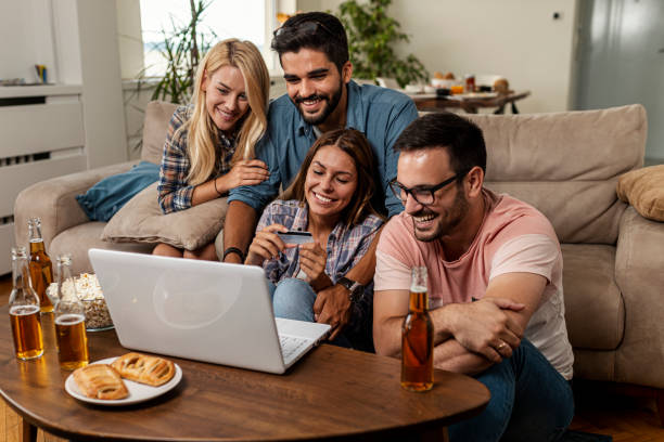 istock Friends shopping online 1298408828