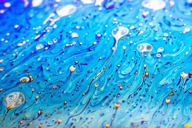 istock Beautiful psychedelic abstraction formed by light on the surface of a soap bubble 1298410763