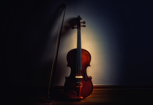 Classic violin on a dark background stock photo