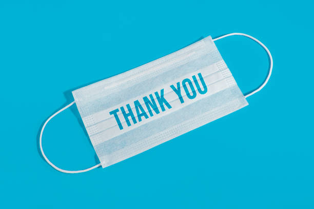istock White Protective Mask with Thank You Message 1298412152