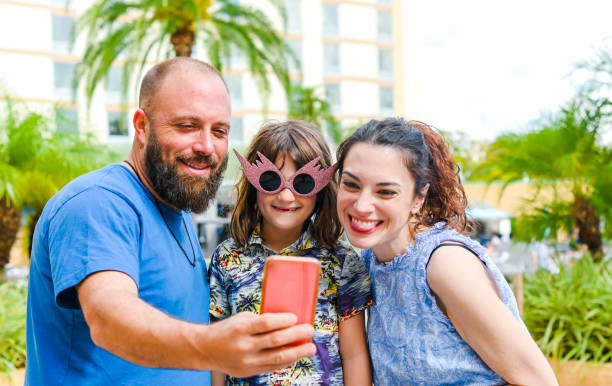 istock Family on vacation take a selfie together 1298430019