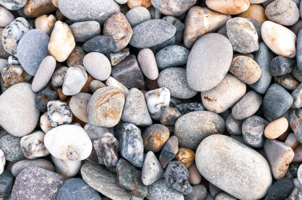 istock Pebbles on the Mediterranean coast. Natural background for your projects. Travel concept. 1298434427