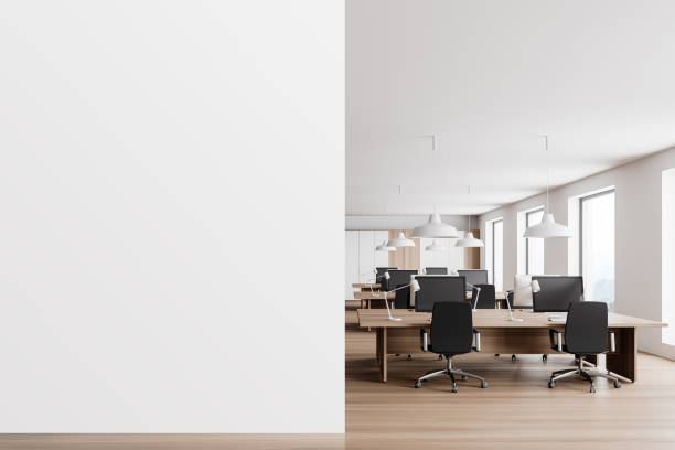 istock White and wooden open space office interior with mock up wall 1298434800