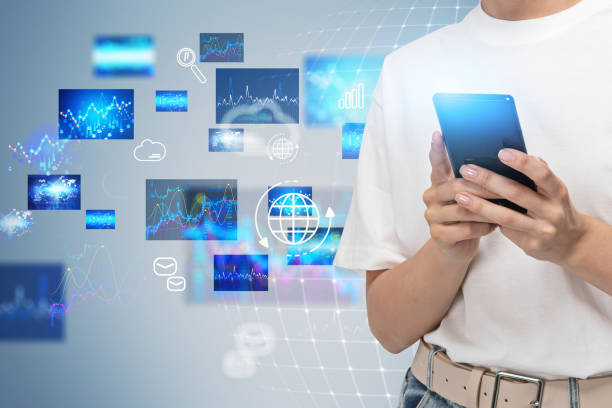 istock Woman with smartphone, financial interface 1298437752