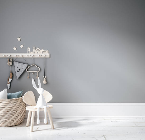 istock Blank wall mock up in cozy nursery interior background, Scandinavian style 1298439472