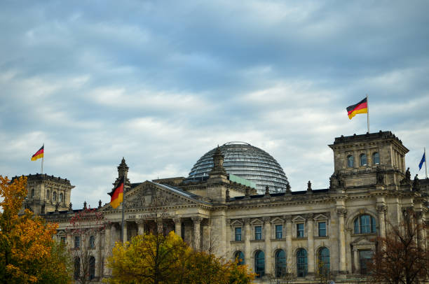 istock Berlin, Germany - October 13, 2013: The Rebuilt Reichstag on a cloudy day 1298441612