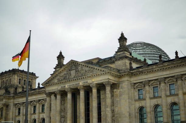 istock Berlin, Germany - October 13, 2013: The Rebuilt Reichstag on a cloudy day 1298441674