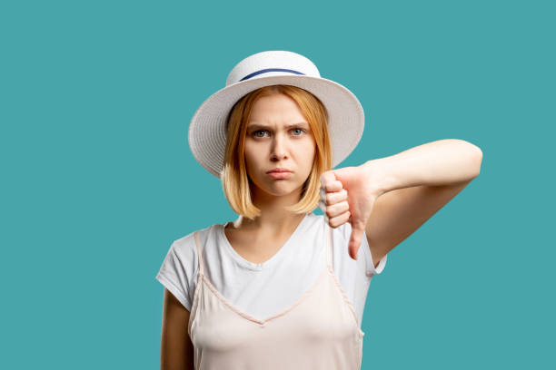 istock dislike gesture disapproval sign sad woman 1298447424