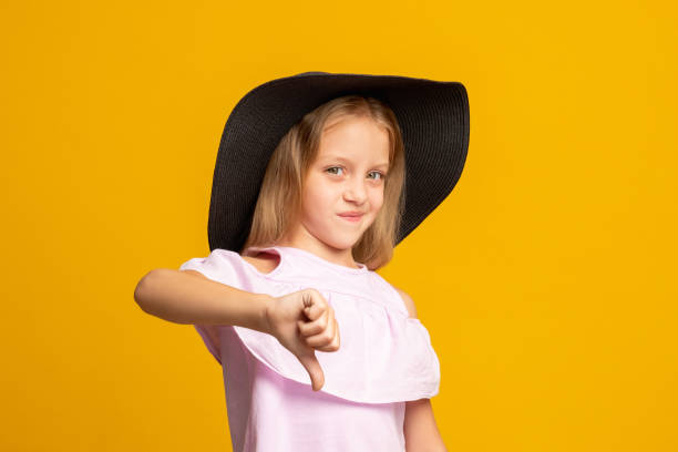 istock dislike gesture skeptik child wrong choice girl 1298447490