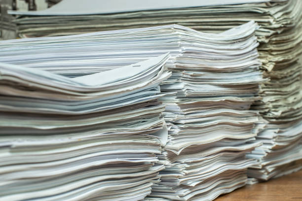 istock pile of paper documents in the office 1298454694