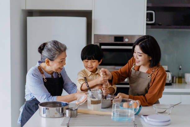 istock Asian Chinese family preparing dough for baking at kitchen together 1298463148