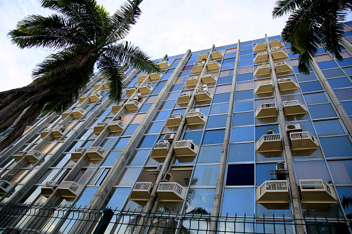 salvador, bahia, brazil - january 25, 2021: air conditioners are seen on the facade of a commercial building in the city of Salvador.