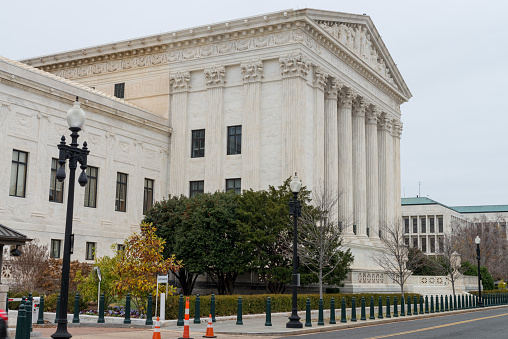 Washington DC, USA - November 30, 2019: US Supreme Court entrance in a cloudy autumn day