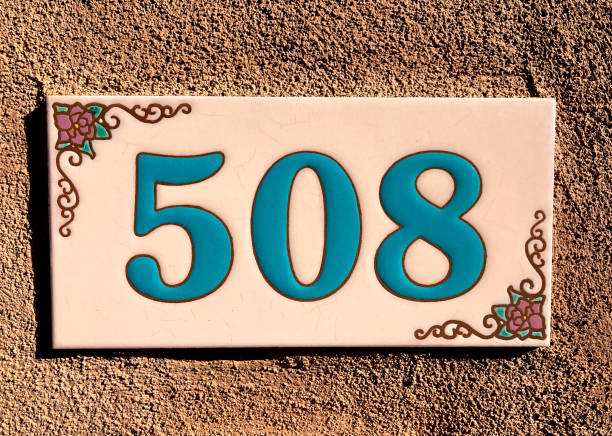 istock Ceramic Number 508 Street Address Tile, Tan Adobe Wall 1298479722