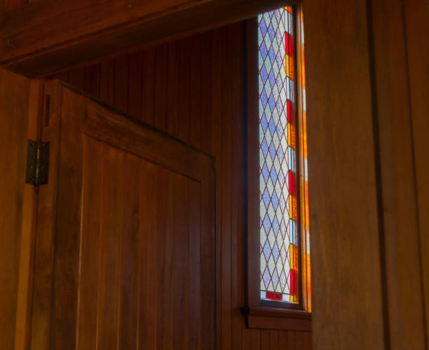 istock Stained glass window from interior of building 1298482295